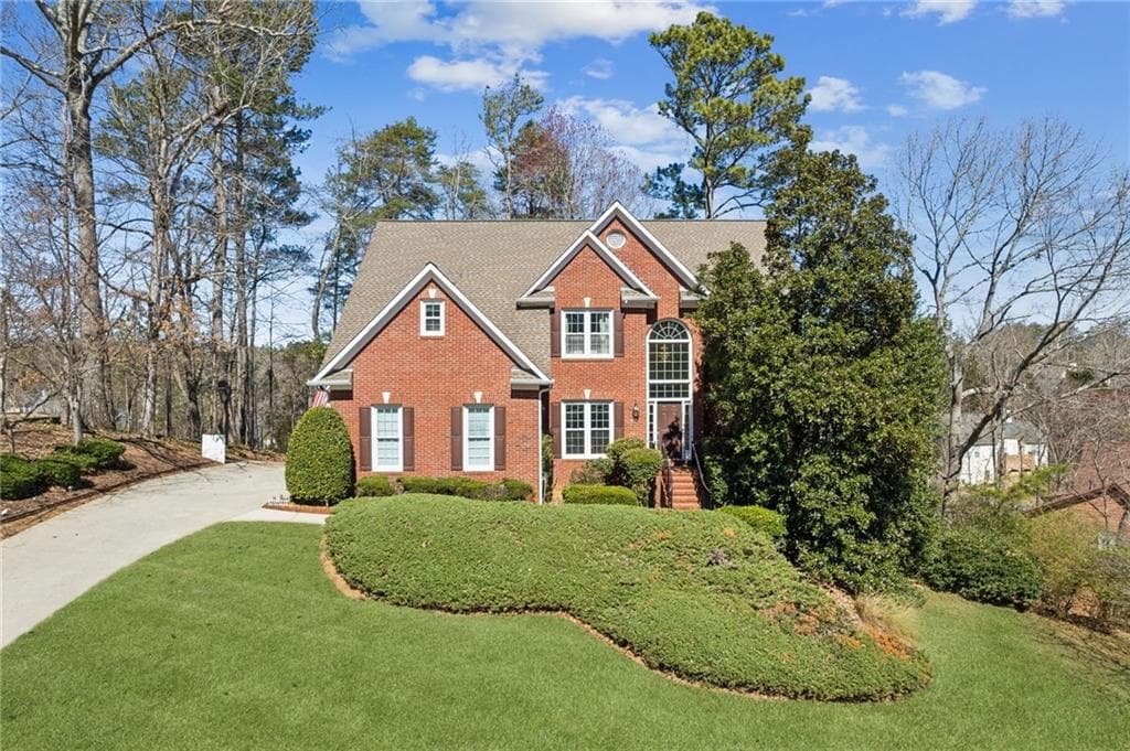 4 bedroom, 3 bathroom single family residence sold at 340 Ruby Forest Parkway, Suwanee, GA 30024
