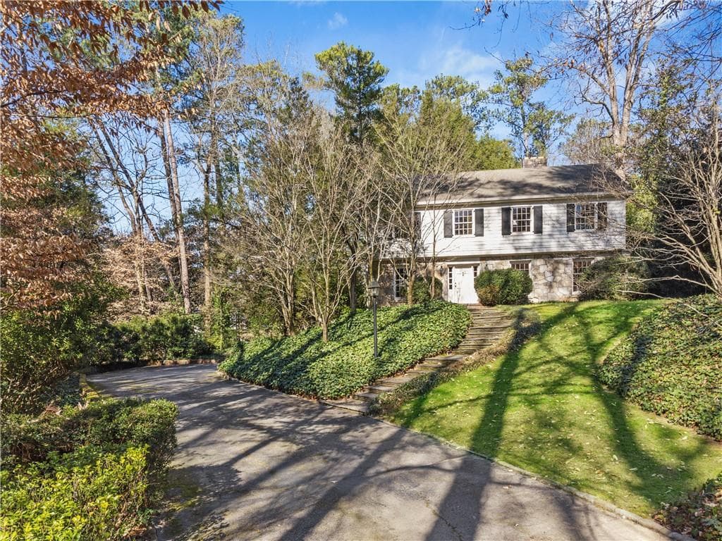 4 bedroom, 3 bathroom single family residence sold at 3200 Wood Valley Road, Atlanta, GA 30327