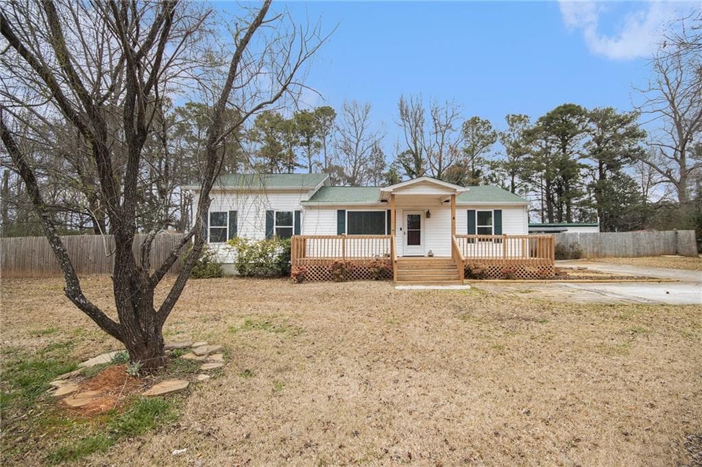 3 bedroom, 2 bathroom single family residence sold at 130 Poplar Road, Newnan, GA 30263