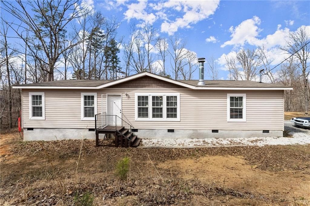 3 bedroom, 2 bathroom single family residence sold at 594 Cherokee Forest Park Drive, Ball Ground, GA 30107