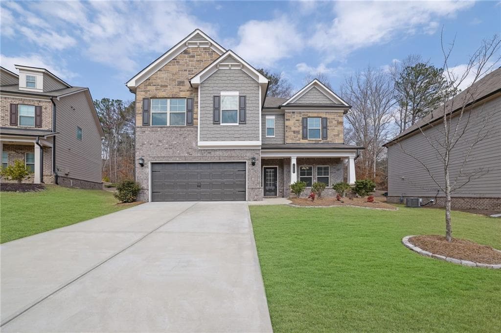 4 bedroom, 3 bathroom single family residence sold at 1777 Holman Forest Court, Hoschton, GA 30548