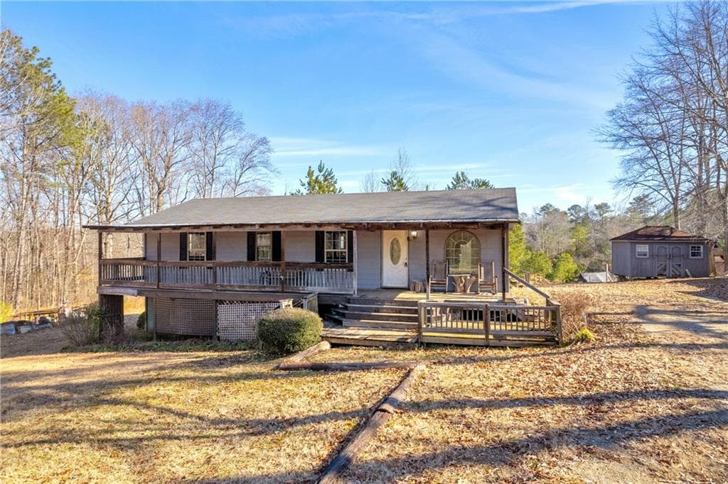 4 bedroom, 2 bathroom single family residence sold at 1315 Woodland Drive, Oxford, GA 30054