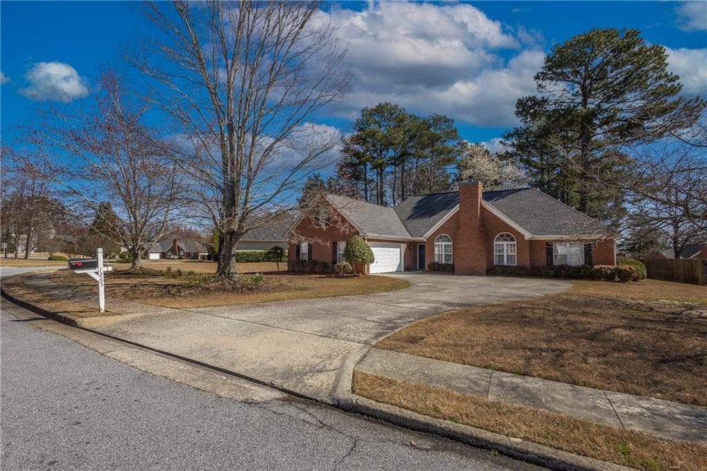 4 bedroom, 2 bathroom single family residence sold at 1265 Fountain Cove Lane, Lawrenceville, GA 30043