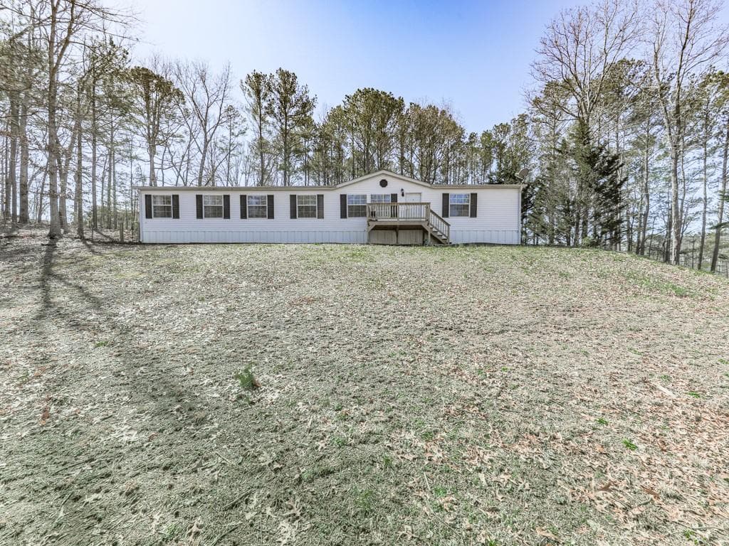 3 bedroom, 2 bathroom single family residence sold at 2743 Ball Ground Road, Ball Ground, GA 30107