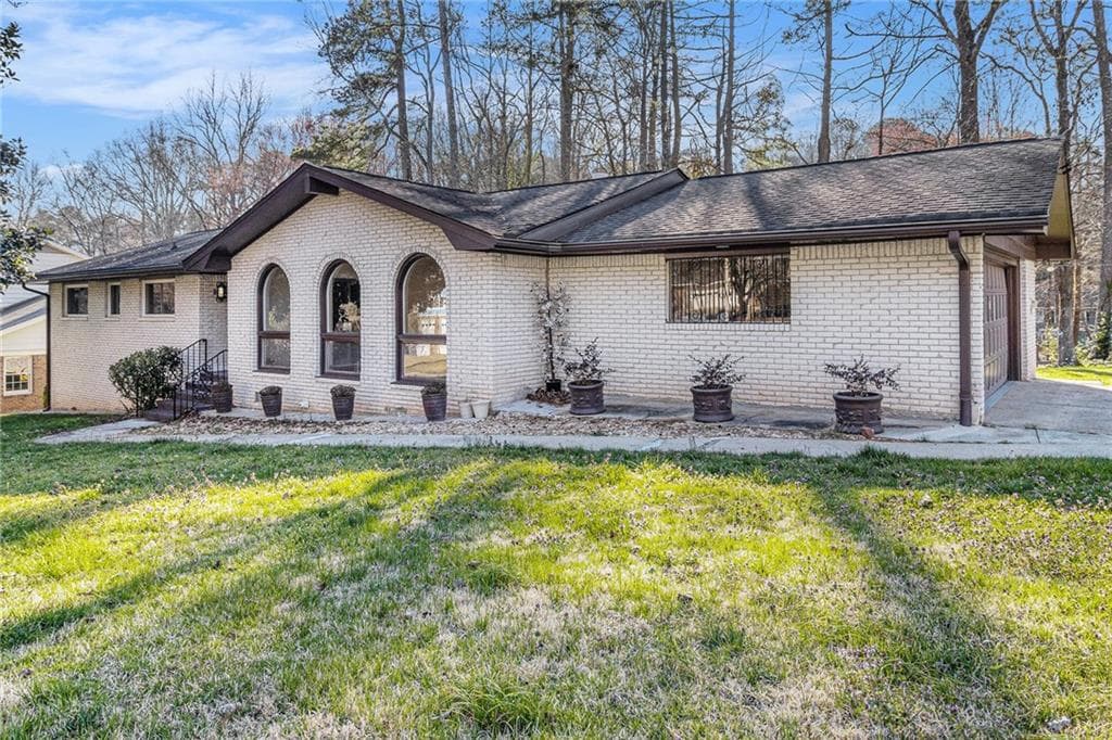 4 bedroom, 3 bathroom single family residence sold at 4551 Cherie Glen Trail, Stone Mountain, GA 30083