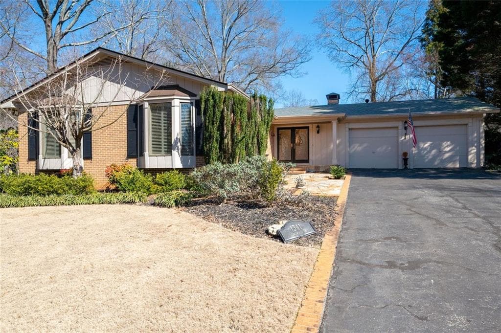 3 bedroom, 3 bathroom single family residence sold at 1341 Longwood Drive, Marietta, GA 30008