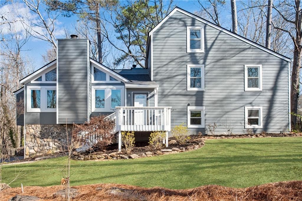 5 bedroom, 4 bathroom single family residence sold at 2421 Spring Lake Drive, Marietta, GA 30062