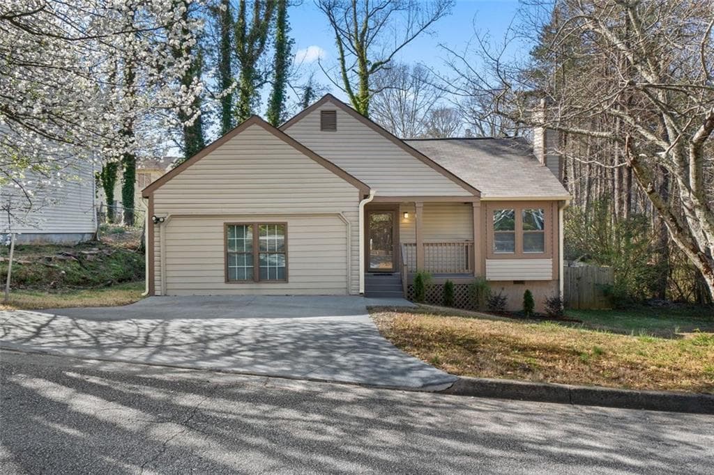 4 bedroom, 2 bathroom single family residence sold at 649 WOODCREST MANOR Drive, Stone Mountain, GA 30083
