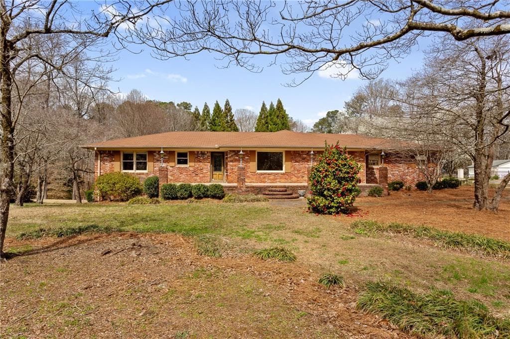 4 bedroom, 3 bathroom single family residence sold at 3241 Sewell Mill Road, Marietta, GA 30062