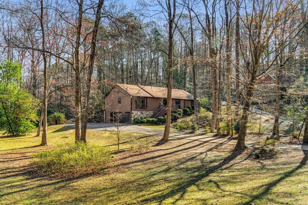 3 bedroom, 2 bathroom single family residence sold at 360 W Spalding Drive, Atlanta, GA 30328