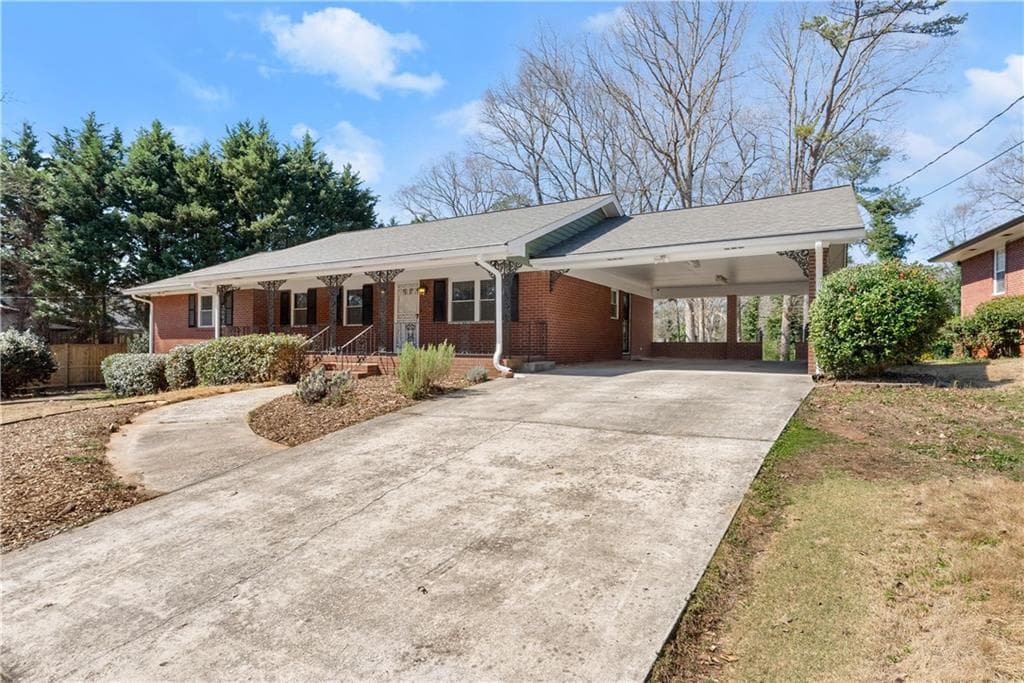 4 bedroom, 3 bathroom single family residence sold at 1421 Downs Drive, Atlanta, GA 30311
