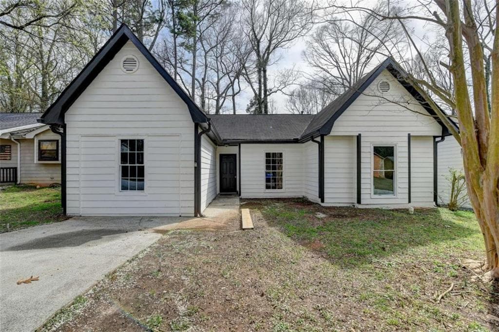 4 bedroom, 2 bathroom single family residence sold at 5393 Ridge Forest Drive, Stone Mountain, GA 30083