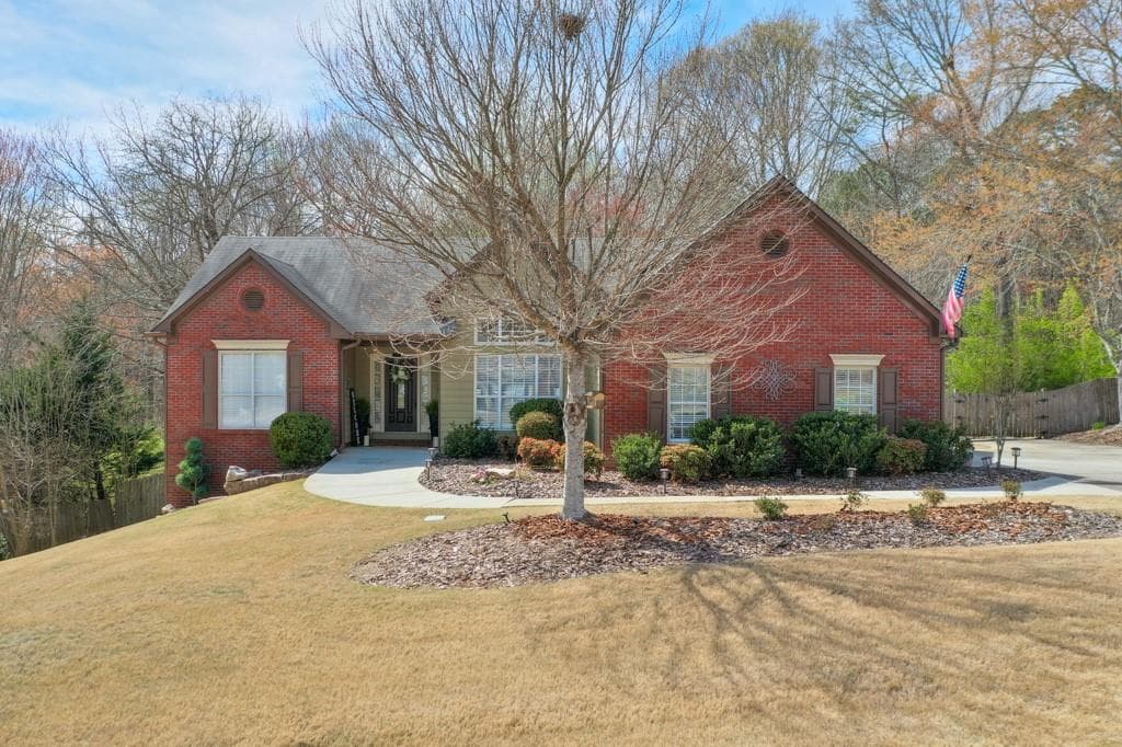 4 bedroom, 3 bathroom single family residence sold at 2020 Huntington Hill Trace, Buford, GA 30519