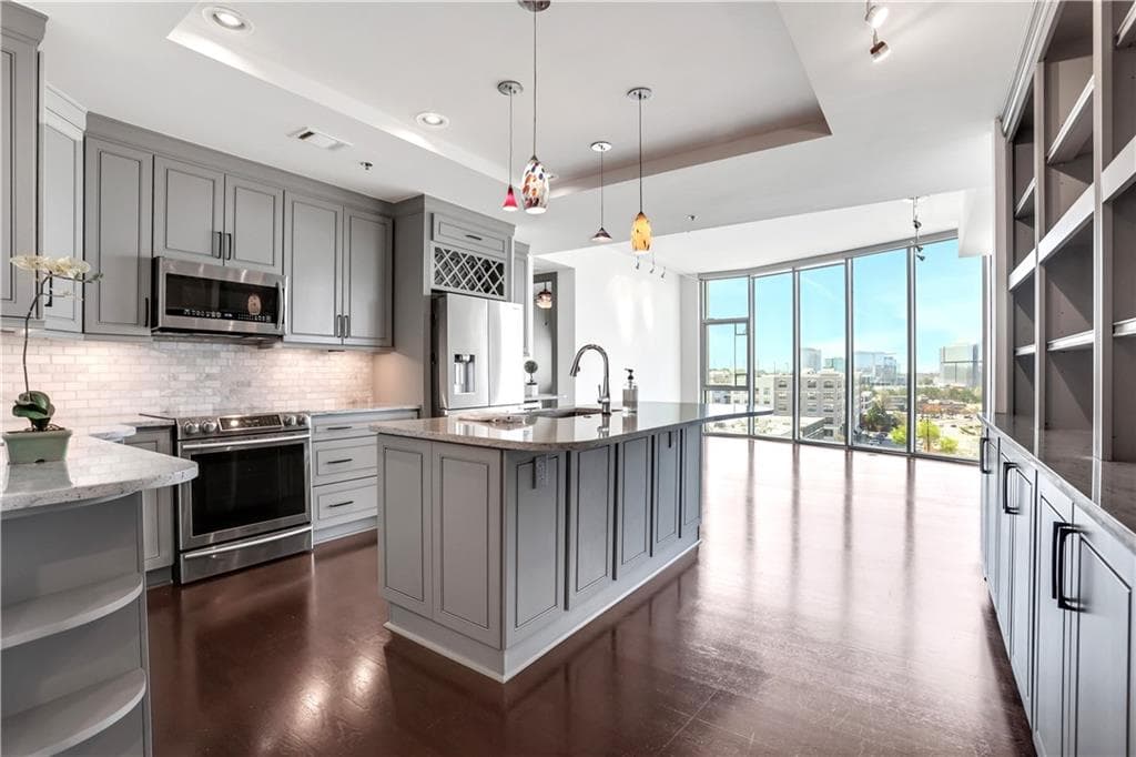 2 bedroom, 2 bathroom, 1,520 sq ft condominium sold at 4561 Olde Perimeter Way 702, Atlanta, GA 30346