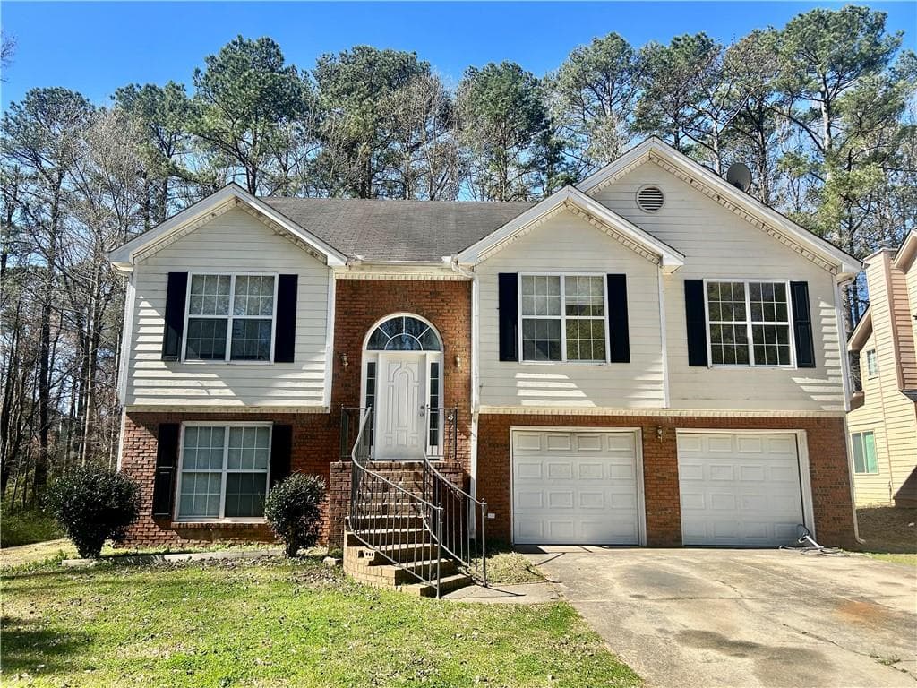 4 bedroom, 3 bathroom single family residence sold at 2695 Lindsey Oak Lane, Lawrenceville, GA 30044
