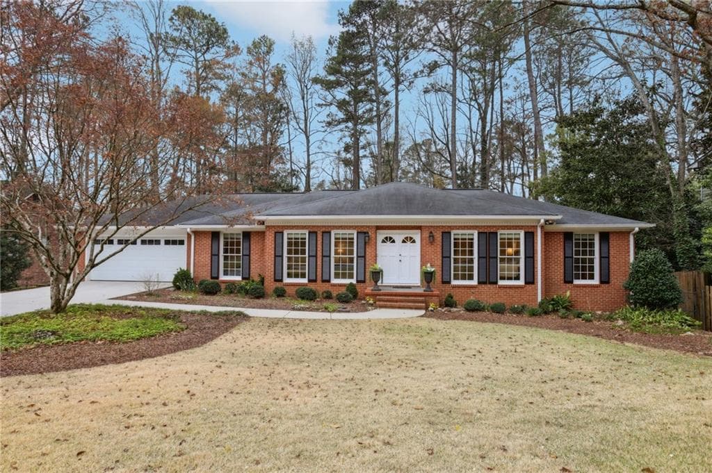4 bedroom, 3 bathroom single family residence sold at 185 W Spalding Drive, Sandy Springs, GA 30328