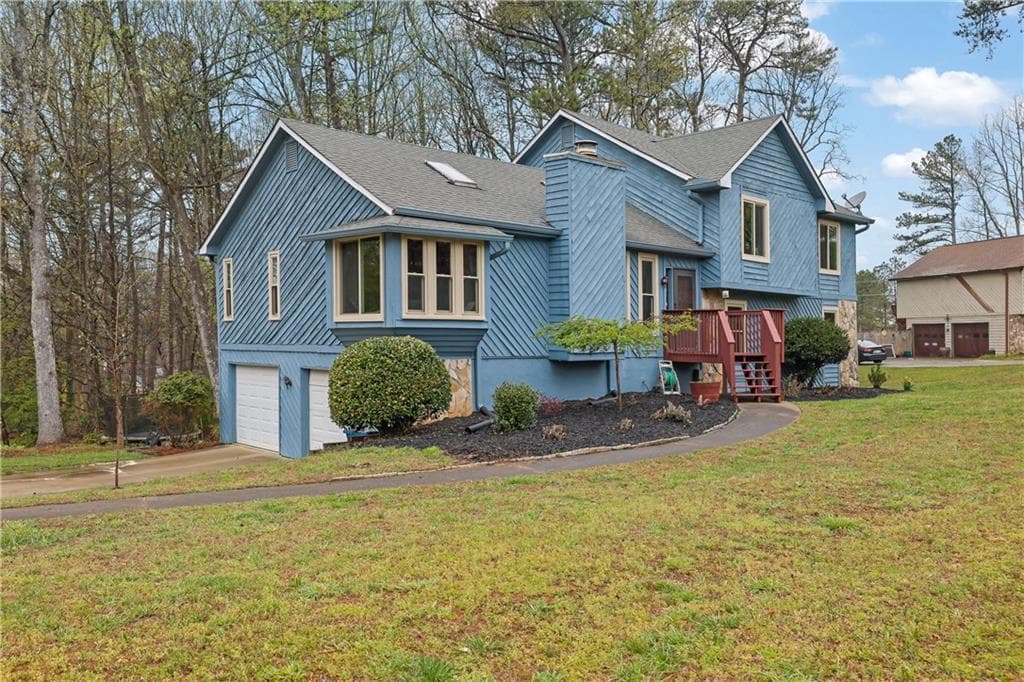 4 bedroom, 3 bathroom single family residence sold at 2735 Peachtree Walk, Duluth, GA 30096