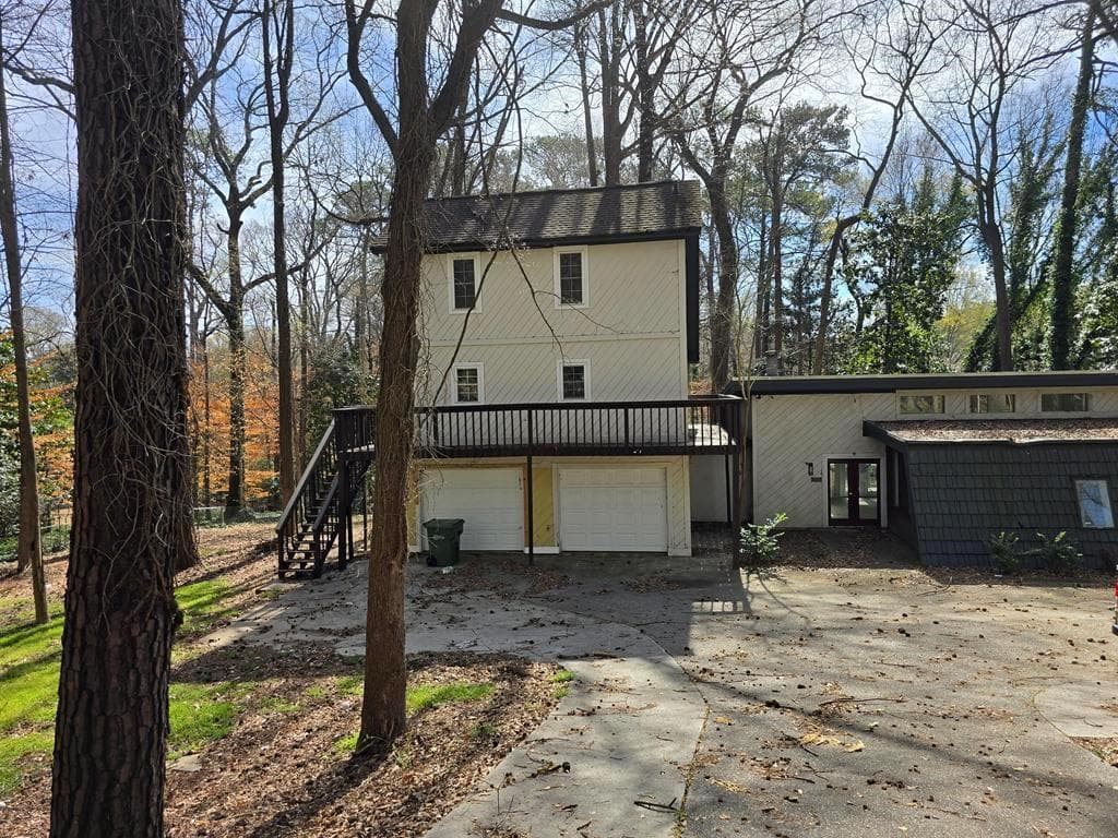 4 bedroom, 3 bathroom, 2,392 sq ft single family residence sold at 1920 Moores Mill Road, Atlanta, GA 30318