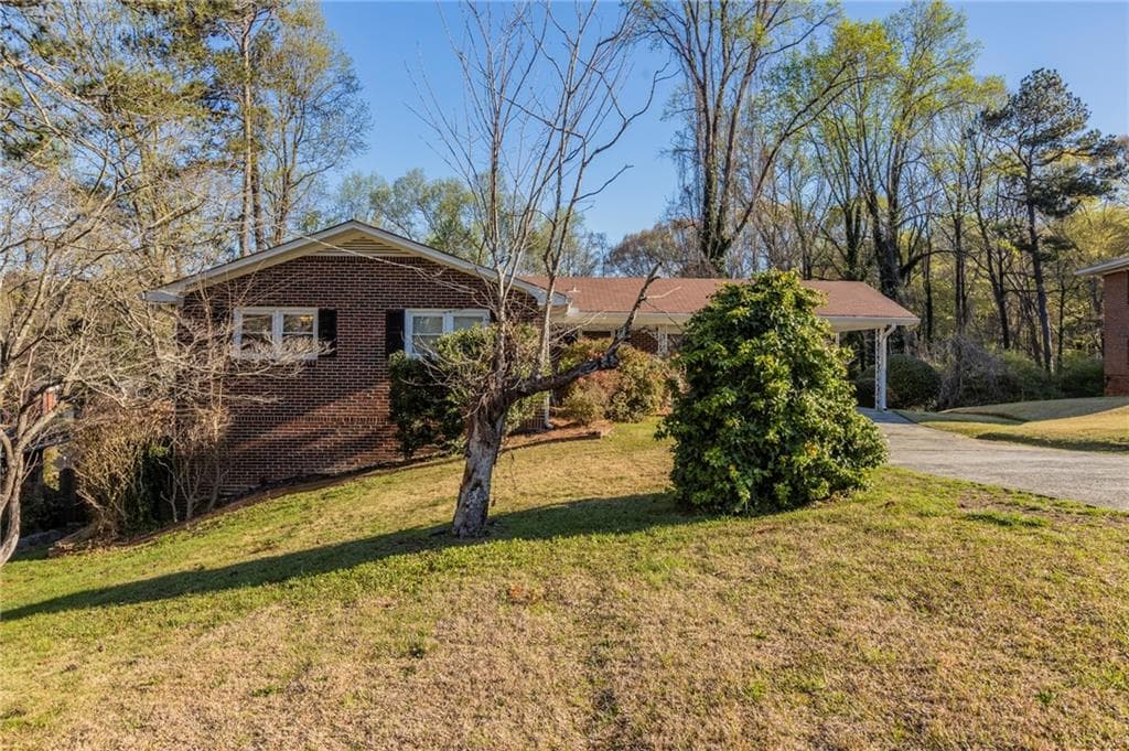 5 bedroom, 3 bathroom, 1,228 sq ft single family residence sold at 761 Caron Circle, Atlanta, GA 30318