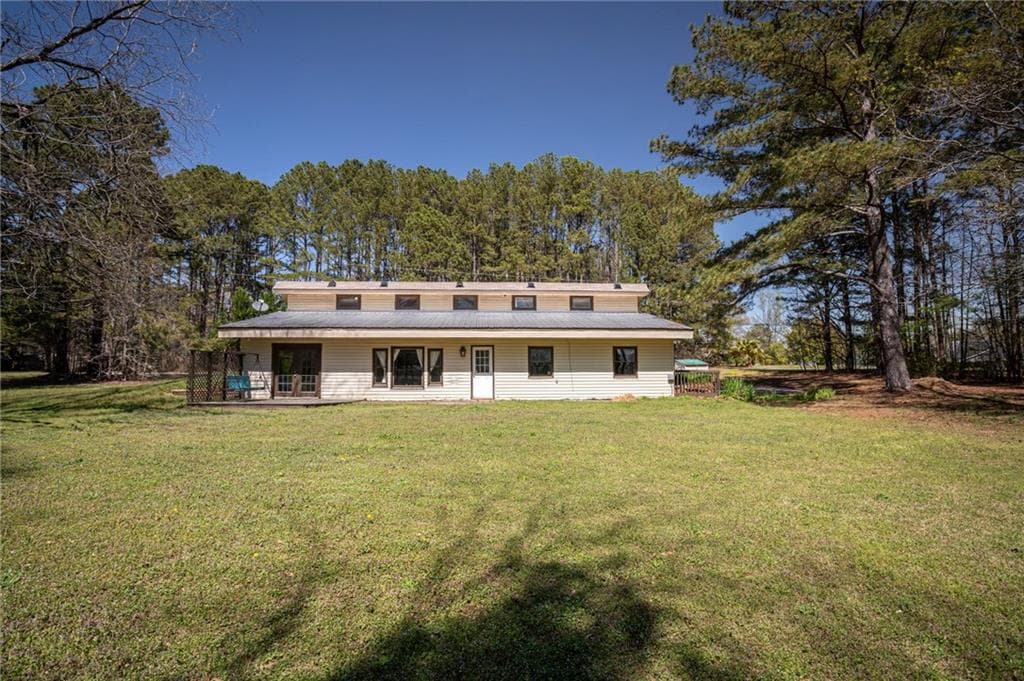 4 bedroom, 2 bathroom single family residence sold at 1050 Whitley Lake Road, Madison, GA 30650