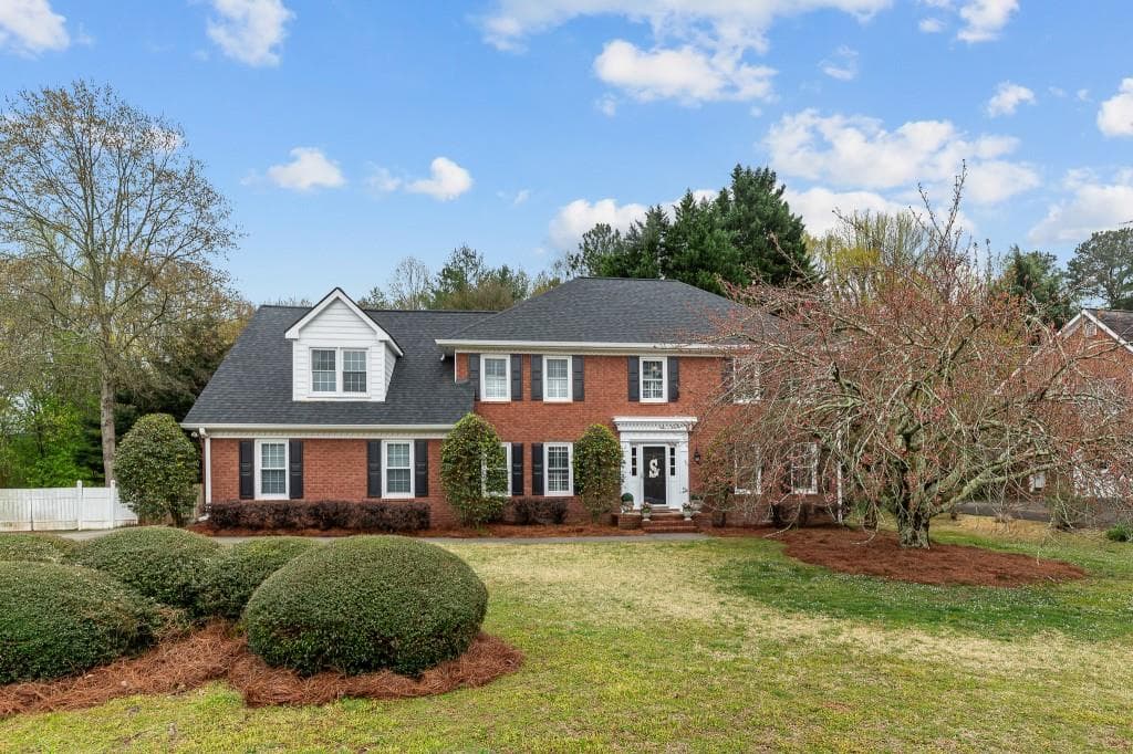 4 bedroom, 3 bathroom single family residence sold at 4938 Woodfall Drive, Lilburn, GA 30047