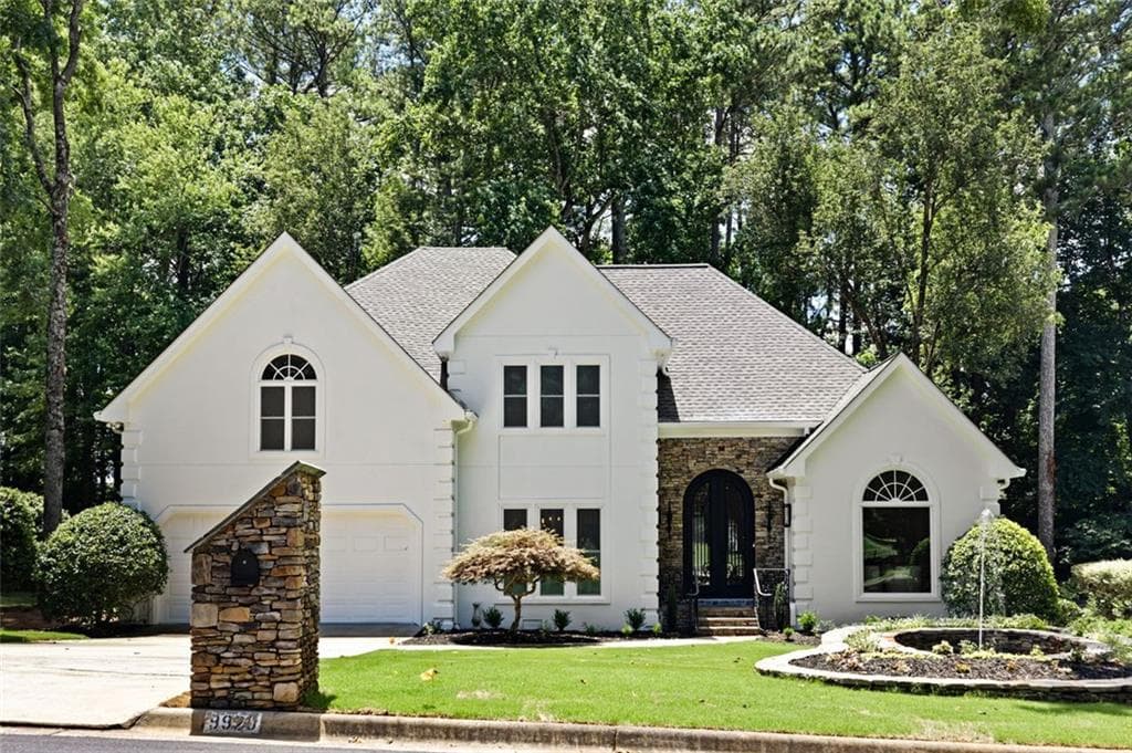 4 bedroom, 5 bathroom single family residence sold at 9920 GROOMSBRIDGE Road, Johns Creek, GA 30022
