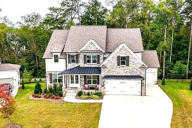 6 bedroom, 5 bathroom single family residence sold at 1102 Sweet Mia Lane, Powder Springs, GA 30127