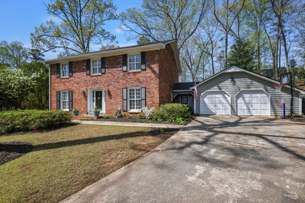 4 bedroom, 3 bathroom single family residence sold at 7130 Spalding Court, Atlanta, GA 30328