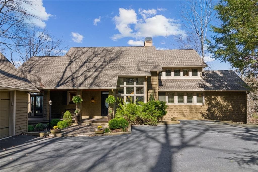 4 bedroom, 5 bathroom single family residence sold at 656 Wild Turkey Bluff, Big Canoe, GA 30143