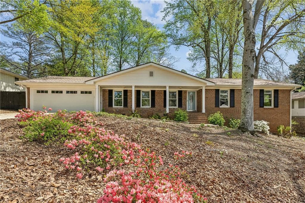 4 bedroom, 4 bathroom single family residence sold at 2947 Dunnington Circle, Chamblee, GA 30341