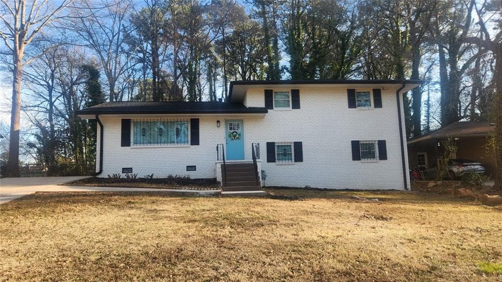4 bedroom, 2 bathroom single family residence sold at 2653 Williamsburg Drive, Decatur, GA 30034