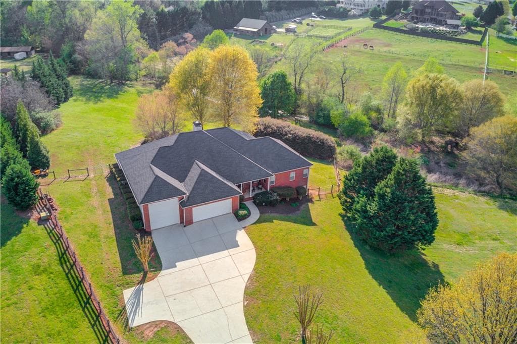 4 bedroom, 3 bathroom single family residence sold at 982 Dee Kennedy Road, Auburn, GA 30011