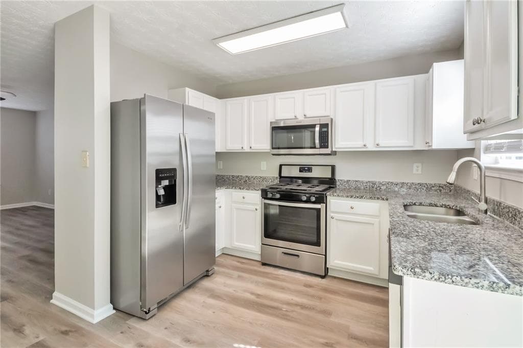 4 bedroom, 3 bathroom, 1,559 sq ft single family residence under contract at 344 Springbottom Court, Lawrenceville, GA 30046 — photo 7
