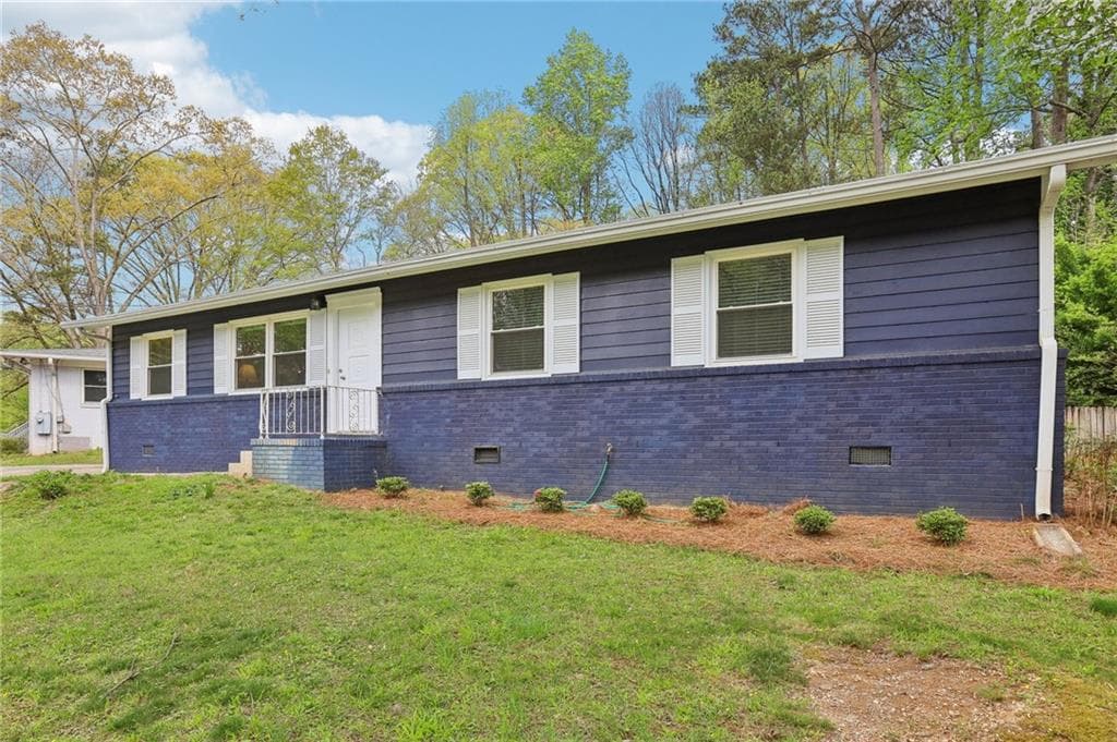 3 bedroom, 2 bathroom single family residence sold at 2407 Ridgeway Drive, Doraville, GA 30360