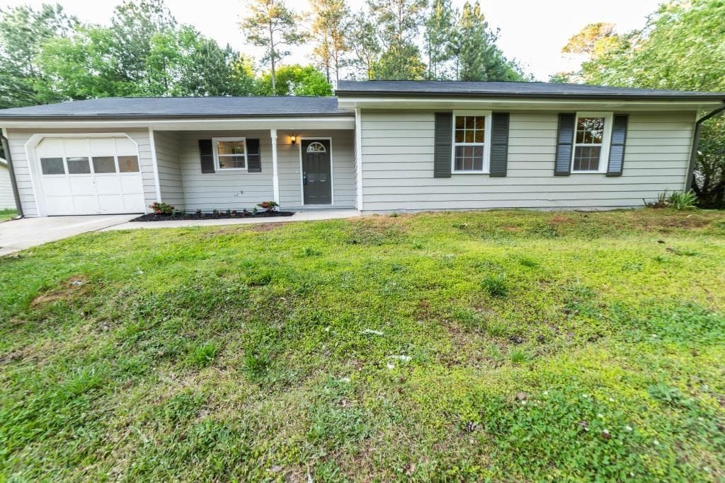 3 bedroom, 2 bathroom single family residence sold at 945 Navajo Trail, Covington, GA 30016