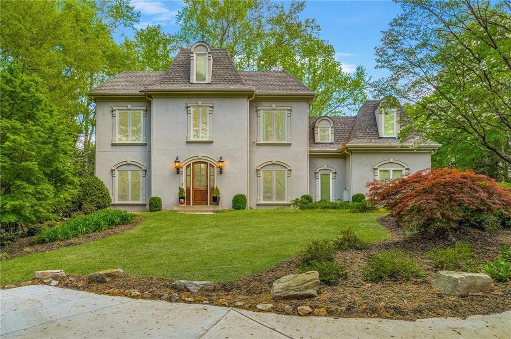 6 bedroom, 7 bathroom, 7,173 sq ft single family residence sold at 302 Rolling Rock Road, Marietta, GA 30067
