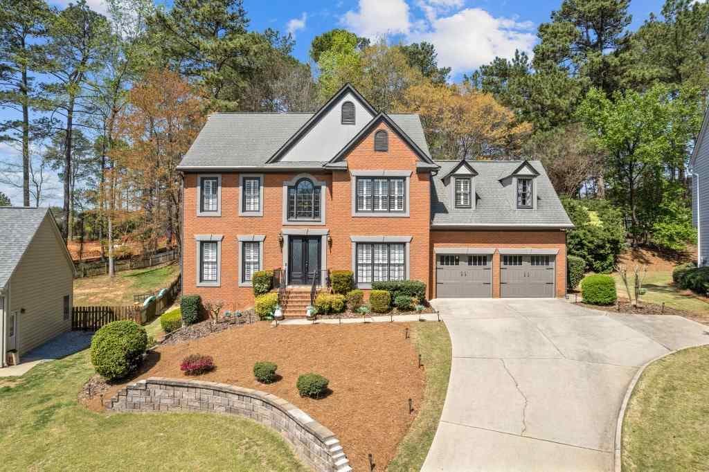 5 bedroom, 3 bathroom single family residence sold at 11570 Dunhill Place Drive, Johns Creek, GA 30005