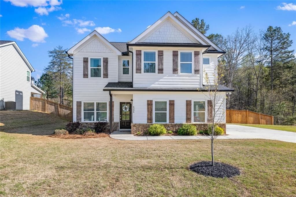 4 bedroom, 3 bathroom single family residence sold at 6306 Woodland Station Drive, Lula, GA 30554