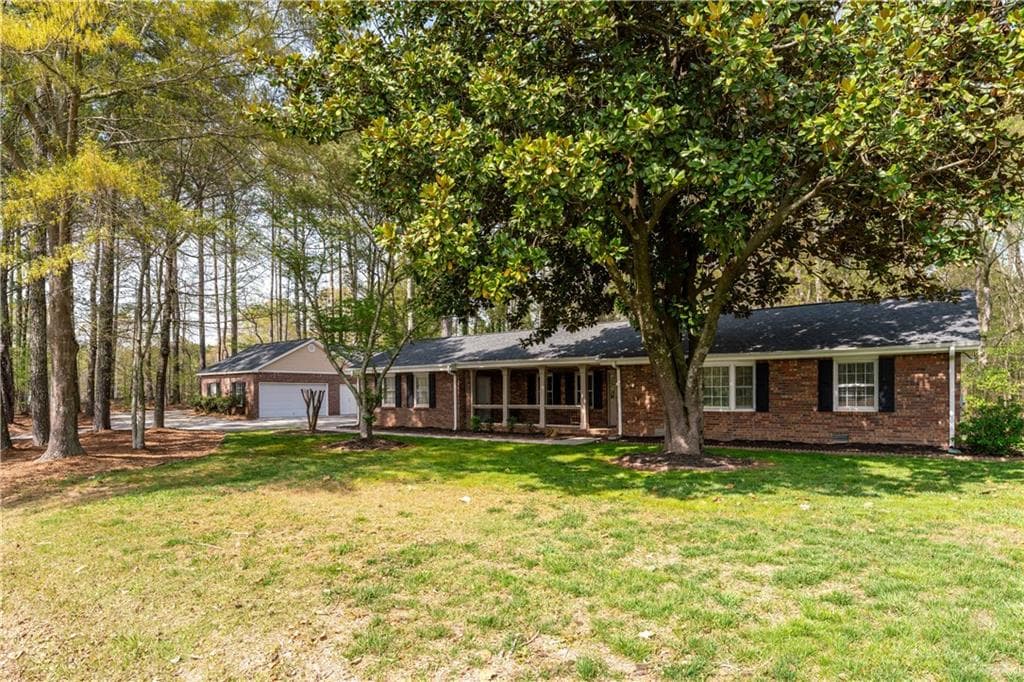 3 bedroom, 2 bathroom single family residence sold at 4220 Smith Road, Loganville, GA 30052