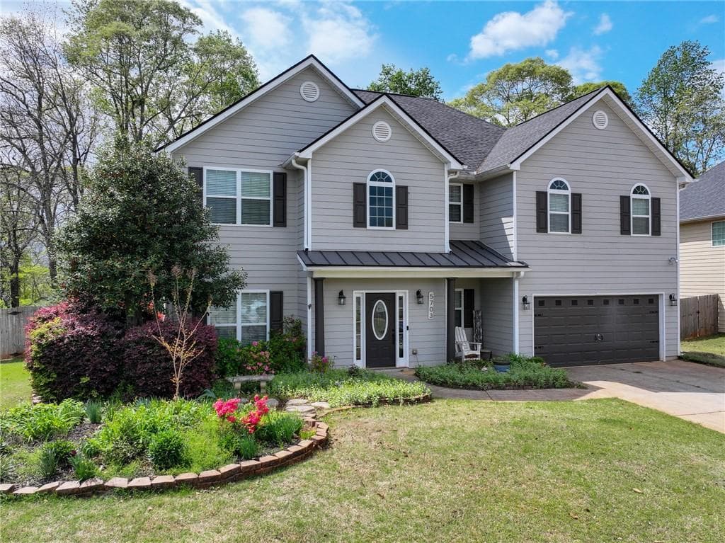4 bedroom, 3 bathroom single family residence sold at 5703 Calm Valley Point, Flowery Branch, GA 30542