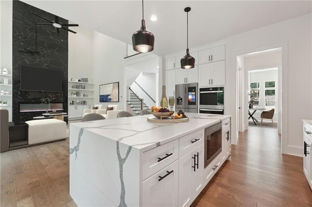 5 bedroom, 4 bathroom, 5,089 sq ft single family residence for sale at 3950 Clifton Hill Court #13, Cumming, GA 30040 — photo 2