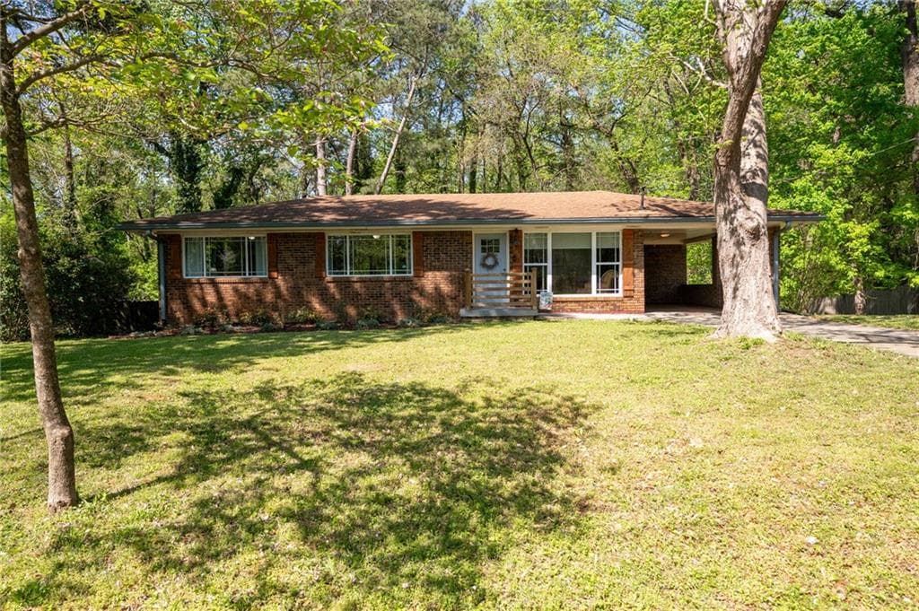 4 bedroom, 3 bathroom single family residence sold at 1650 Randee Street, Atlanta, GA 30318