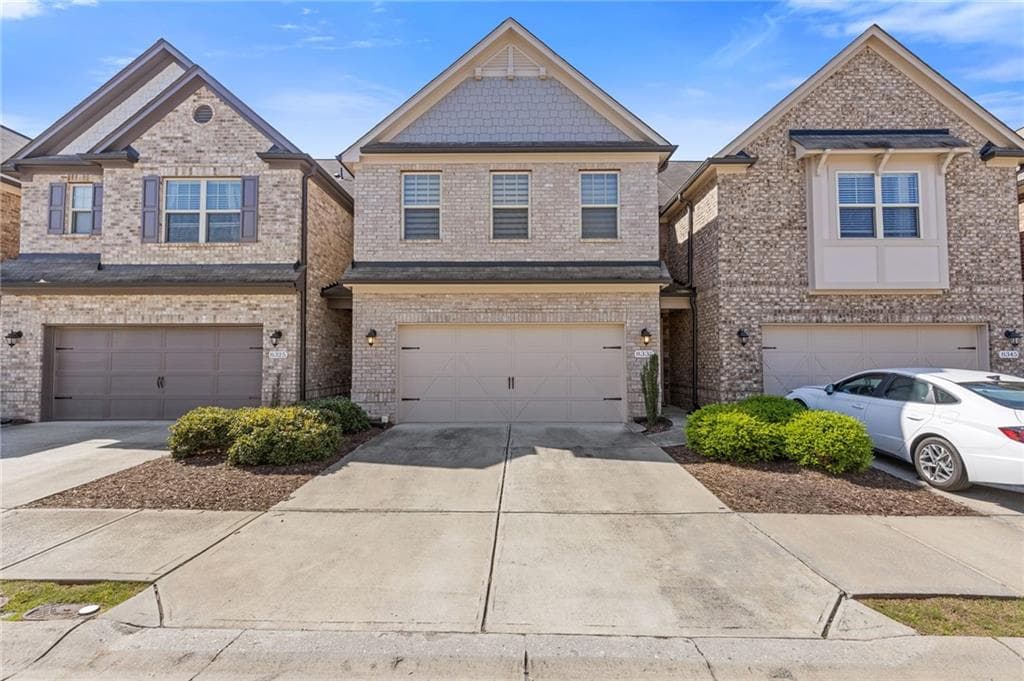 4 bedroom, 4 bathroom townhouse sold at 8335 Village Place, Suwanee, GA 30024