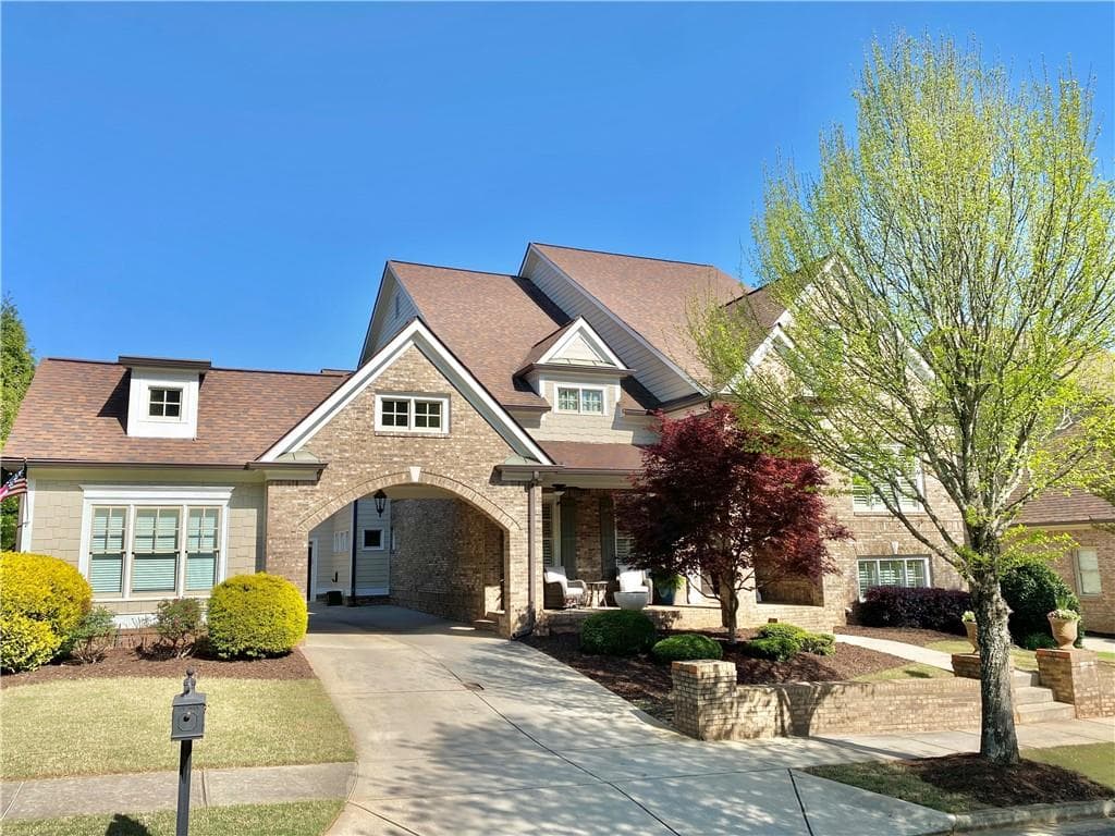 6 bedroom, 7 bathroom, 6,997 sq ft single family residence sold at 311 Carmichael Circle, Canton, GA 30115