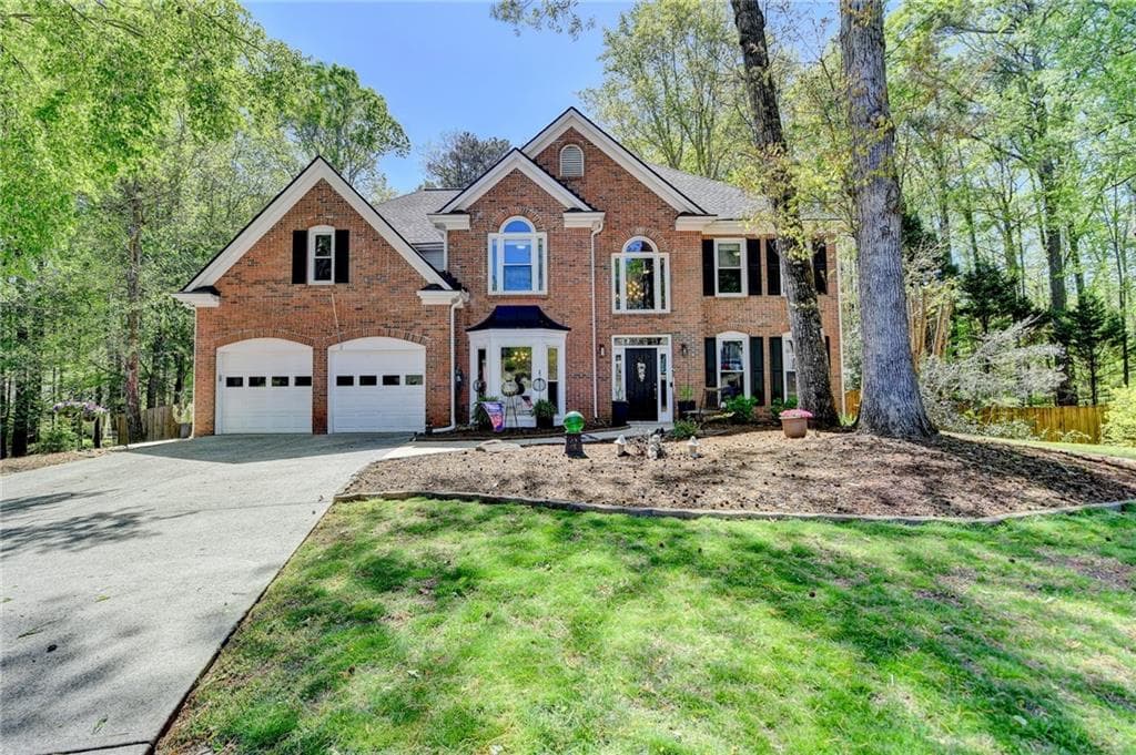 5 bedroom, 3 bathroom single family residence sold at 6980 Devonhall Way, Duluth, GA 30097