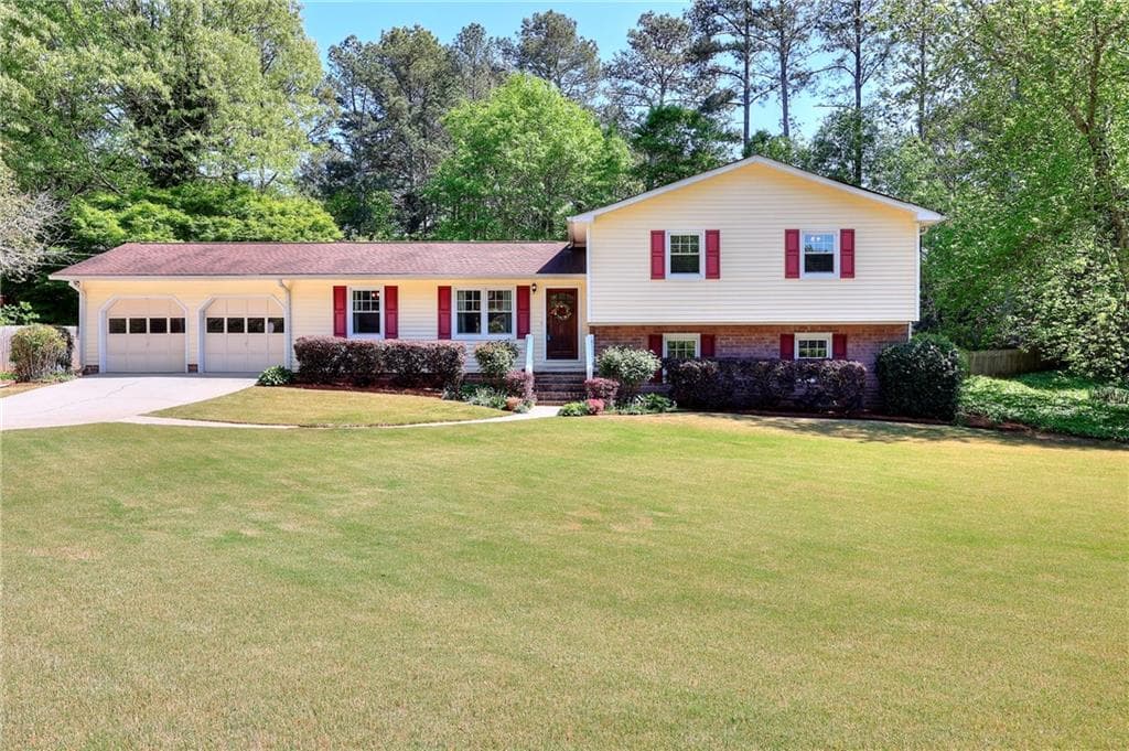 4 bedroom, 2 bathroom single family residence sold at 4172 Whispering Forest Court, Lilburn, GA 30047