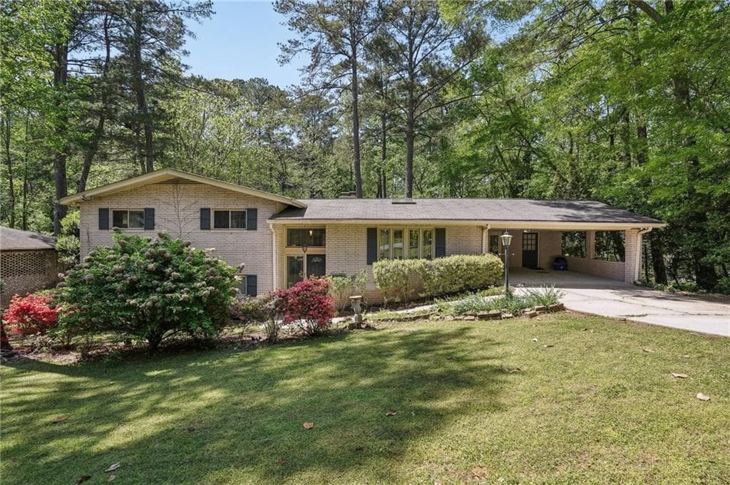 4 bedroom, 3 bathroom single family residence sold at 1496 Country Squire Drive, Decatur, GA 30033