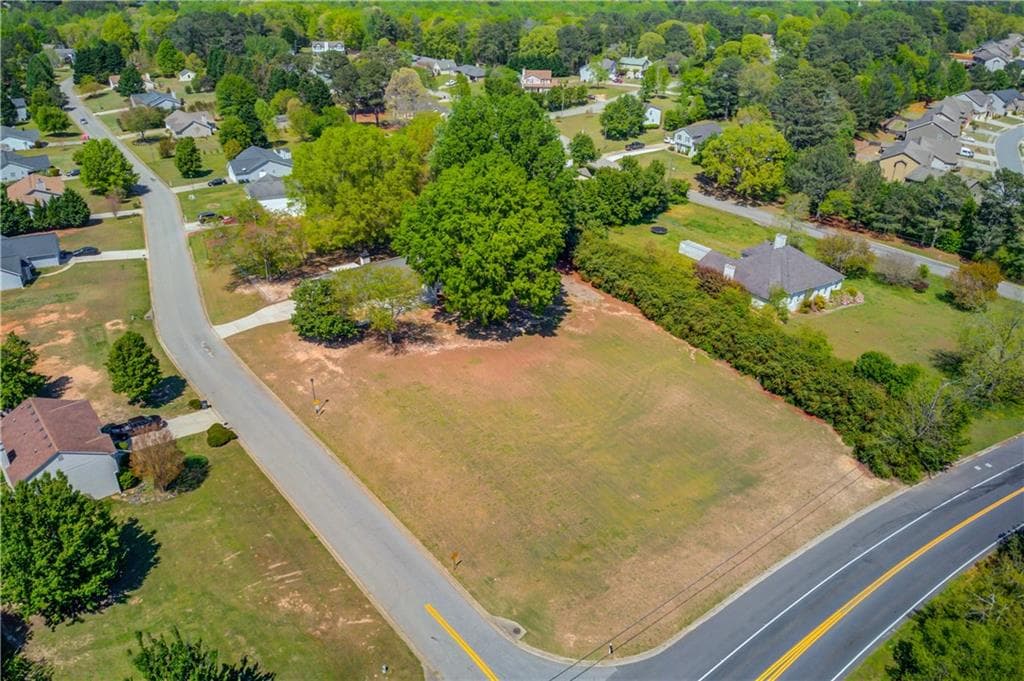 4 bedroom, 2 bathroom single family residence sold at 1312 Harbins Road, Dacula, GA 30019