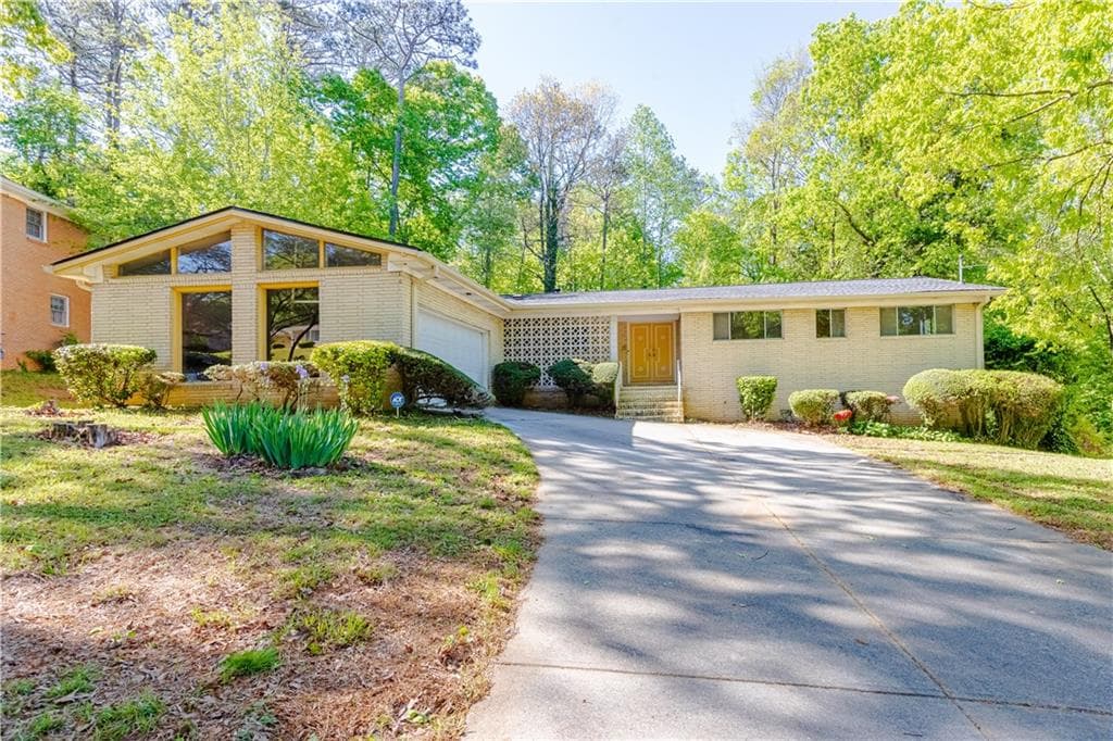 4 bedroom, 3 bathroom, 1,880 sq ft single family residence sold at 558 Larchmont Drive, Atlanta, GA 30318