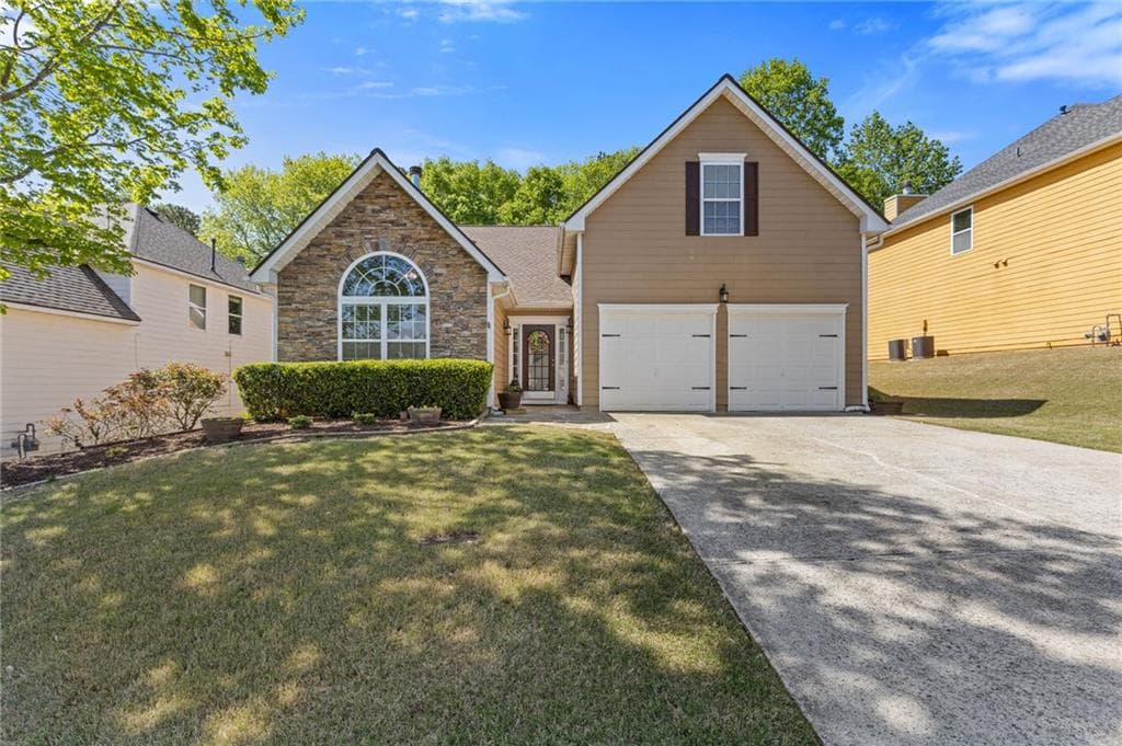 4 bedroom, 3 bathroom single family residence sold at 1050 Rockbass Road, Suwanee, GA 30024